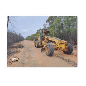 Grader At Work Glass Cutting Board